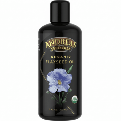 Cold Pressed Flax Oil by Andreas Seed Oils in a 7 fl. oz black bottle with a blue flower design.