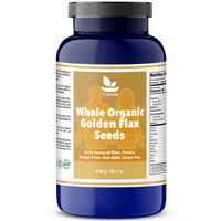 Golden Flax Seeds in a blue jar, a source of Organic Gluten Free Plant Protein, high in fiber and omega-3 fats.