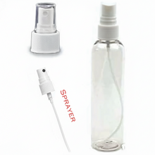Clear spray bottle with white nozzle on a white background