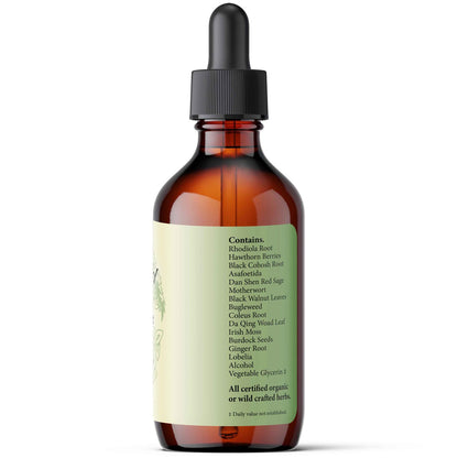 Bottle of herbal tincture with dropper on a white background