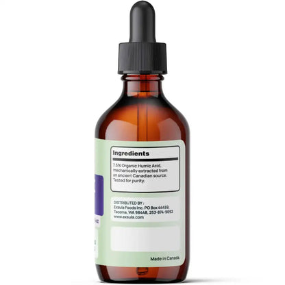 Brown glass bottle with dropper on a white background