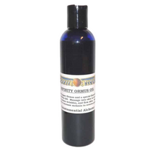 Bottle of Infinity Ormus Oil with a label on a white background
