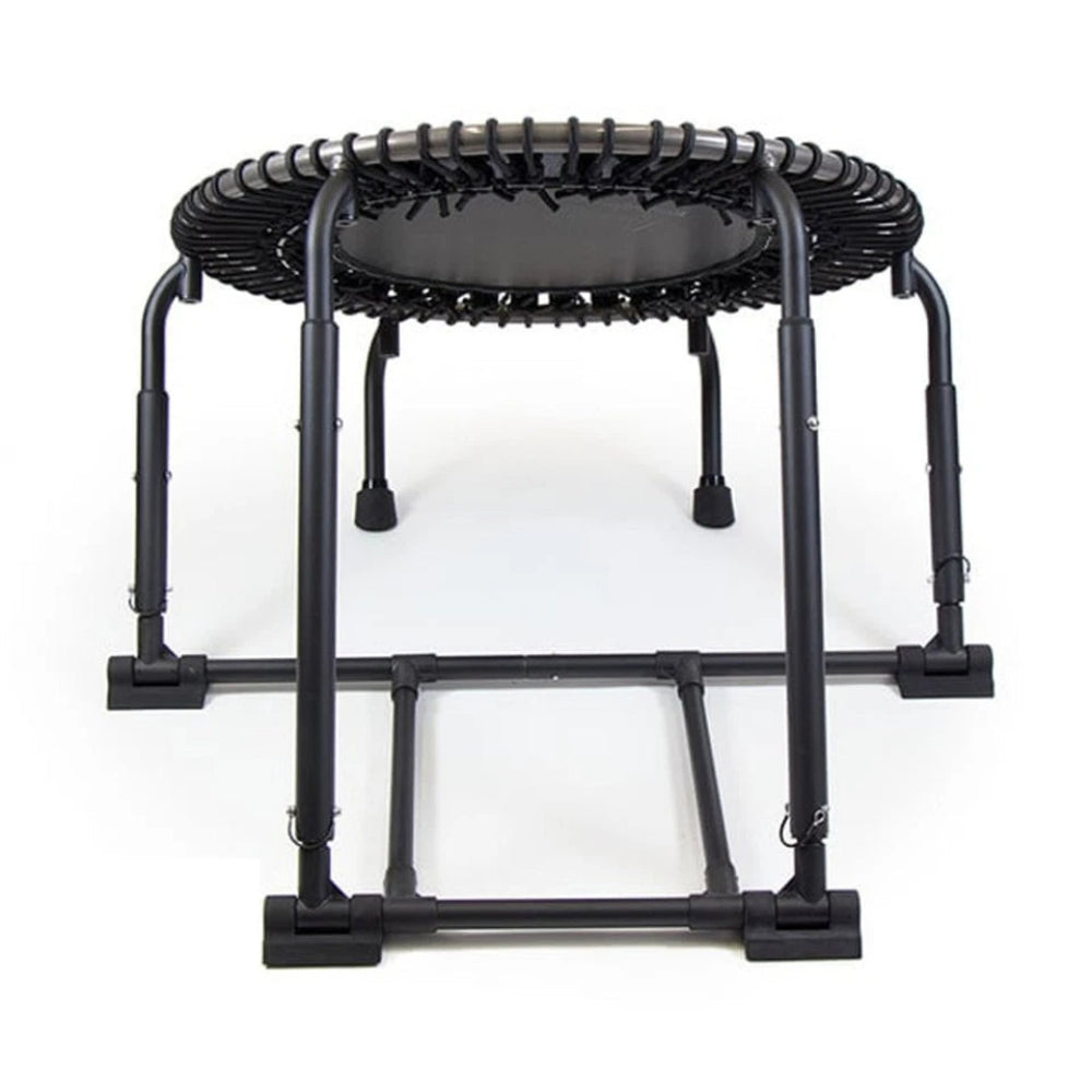 Black fitness trampoline on a white background