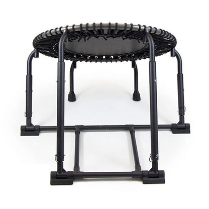 Black fitness trampoline on a white background