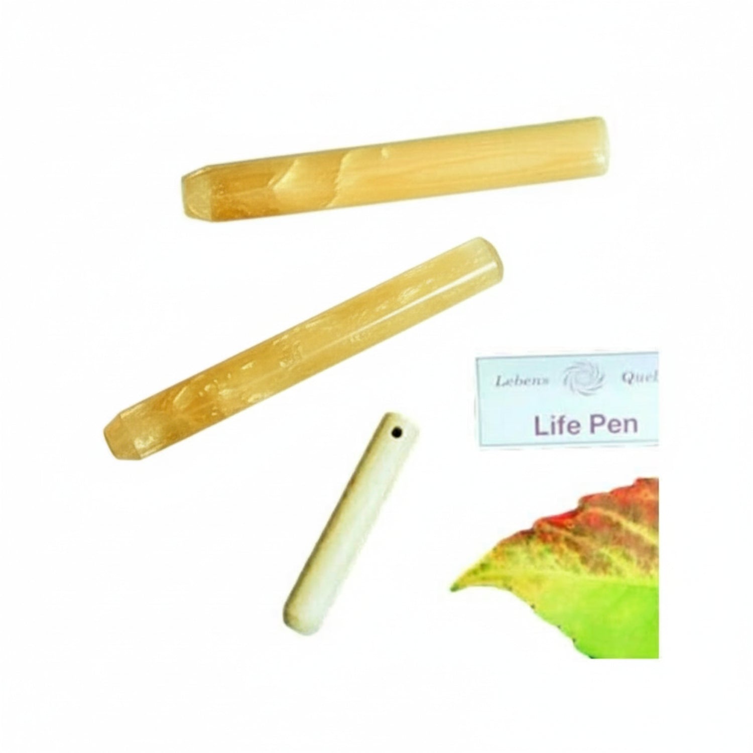 Three wooden sticks with a 'Lebens Quelle' label and 'Life Pen' text on a white background with a leaf