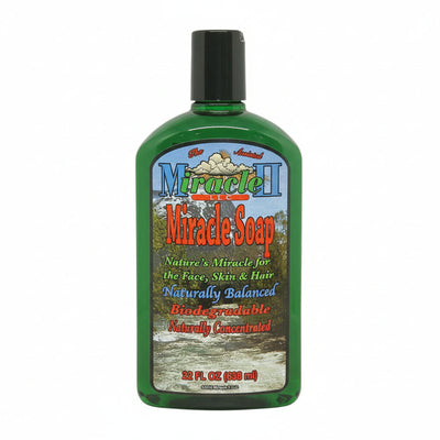 Bottle of non-foaming Miracle Soap II 22oz with a green label on a white background