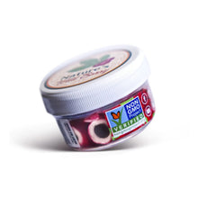 Jar of MIracle Berries with Non-GMO Project verification label on a white background