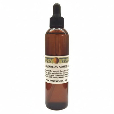 brown spray bottle of Aura Cleansing ORMUS Mist, logo of wings around a circle, special essential oils, spray anytime to strengthen energetic field, www.OrmusOils.com