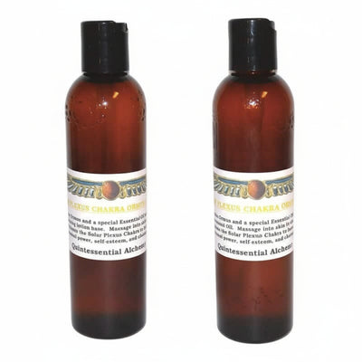 Two bottles of Quintessential Alchemy Solar Plexus Chakra Oils on a white background