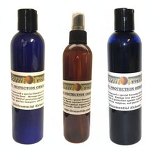 Three bottles of 'Psychic Protection Oil' with labels on a white background