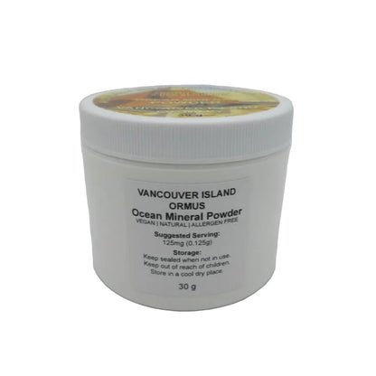 White container of Vancouver Island Ormus Ocean Mineral Powder on a gray background