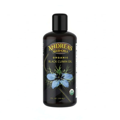 Organic Nigella Sativa Oil in a bottle from Andreas Seed Oils, 7 fl oz, featuring blue flower design.