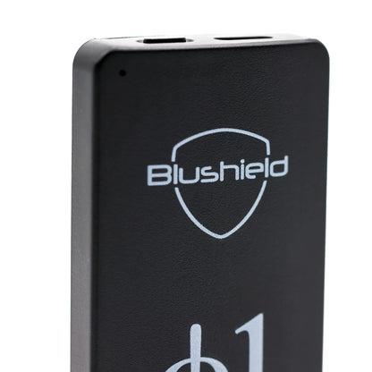 Close-up of a black rectangular electronic device with the Blushield logo printed in white on the front, set against a plain white background.