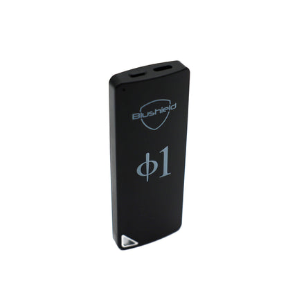 A black rectangular electronic device with rounded corners, featuring the 'Blushield' shield logo and the text 'phi1' printed in light gray on the front, set against a plain white background.