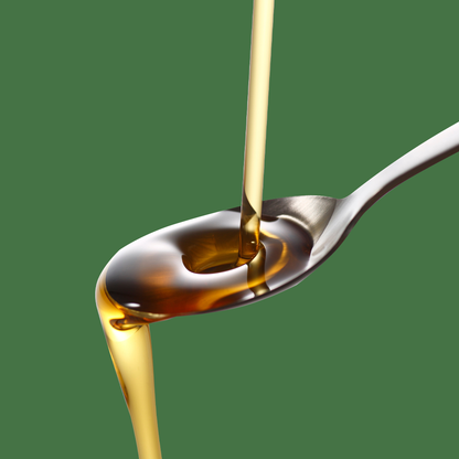 Vitamin D3 with K2 drizzled onto a spoon against a transparent background