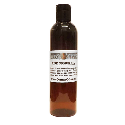 Bottle of pure Ormus oil with a label on a white background