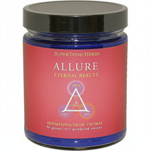 blue jar with black lid and red label, SuperTonicHerb Allure Eternal Beauty, triangle with ORMUS in the center and these words at corners: Shen, Chi and Jing. Rehmannia Dean Thomas, 90 grams, 10:1 powdered extract