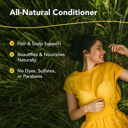 Woman in a yellow dress lying in grass with text about all-natural conditioner benefits.