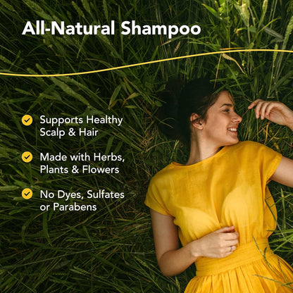 Woman in a yellow dress lying in grass with all-natural shampoo benefits text overlay