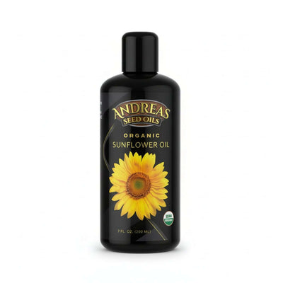 Organic and Cold Pressed Sunflower Oil in a black bottle with a sunflower design.