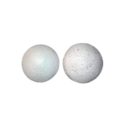 Two white ceramic balls on a white background
