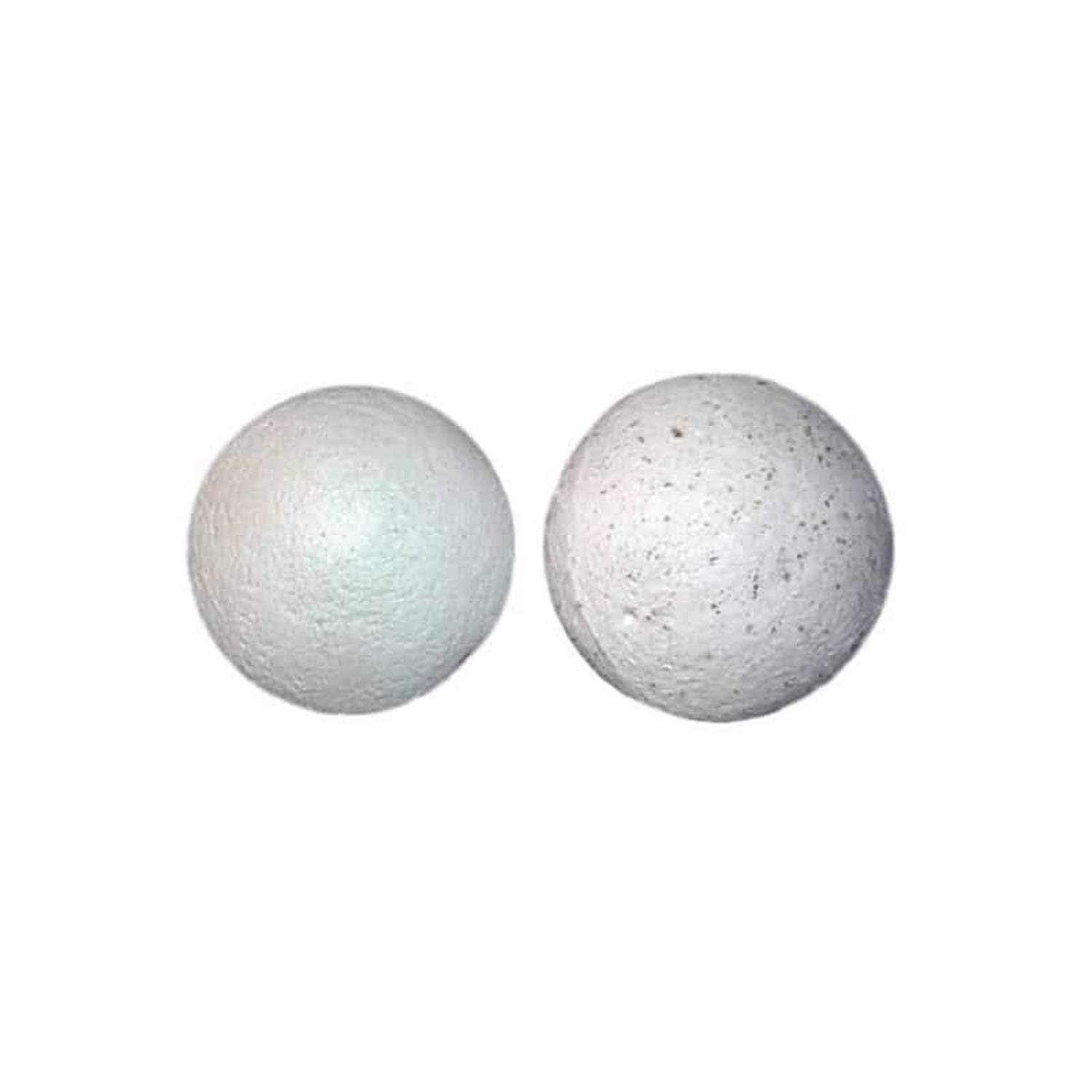 Two white ceramic balls on a white background