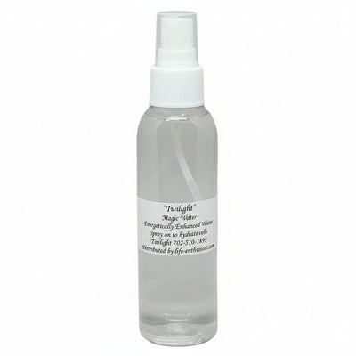 Clear spray bottle of Twilight Magic Water with a white label on a white background