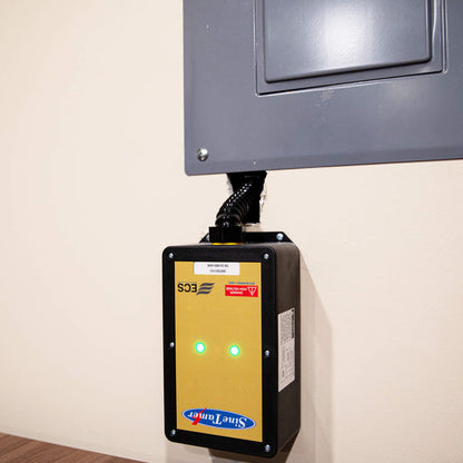 Sine Tamer Dirty Electricity Whole House Filter installed next to an electrical panel.