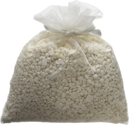 White mesh bag filled with small, round, white mineral prills, labeled as Precious Prills, 3 oz.