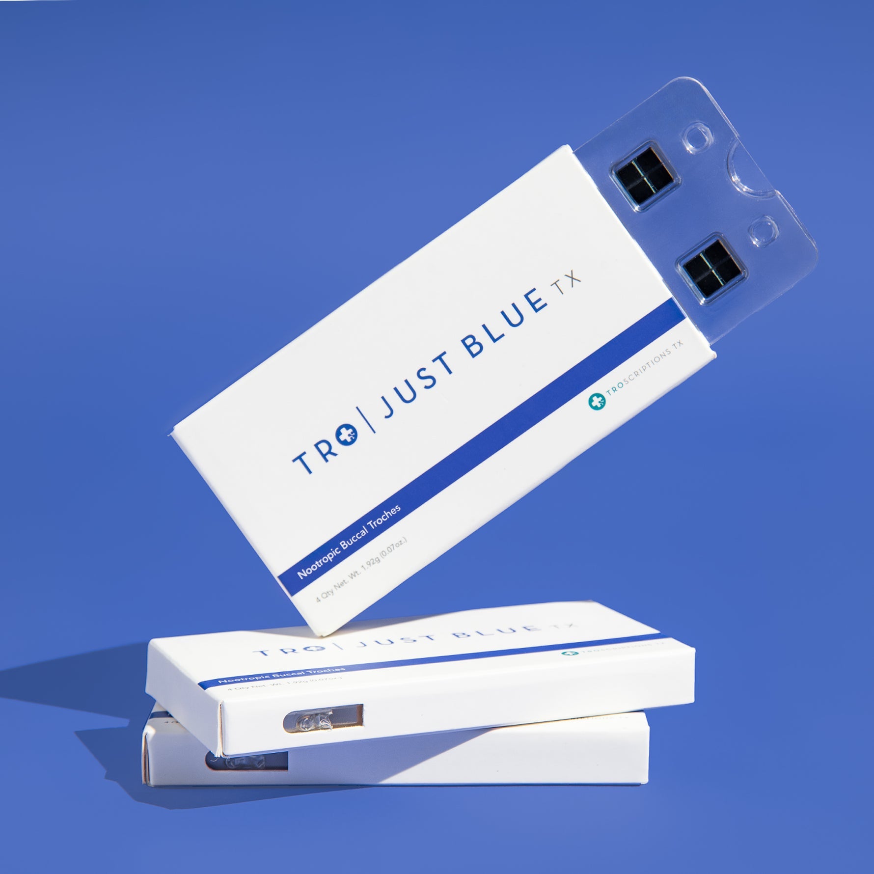 Product packaging for Just Blue, precision dosed buccal troches designed for focus and energy.