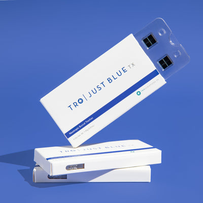 Just Blue Buccal Troches for Mental Focus packaging displayed in an appealing way on a blue background.