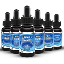 Six amber glass dropper bottles of Ultra Liquid Zeolite arranged in two rows on a white background. The bottles have black droppers and labels with blue, white, and black colors.