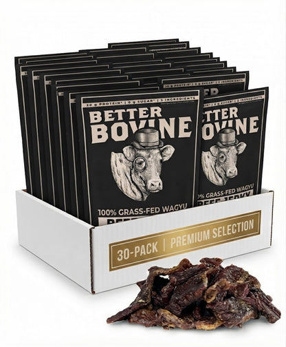 A 30-pack display box filled with Better Bovine beef jerky packets, with a pile of dried beef jerky strips in front on a white background.