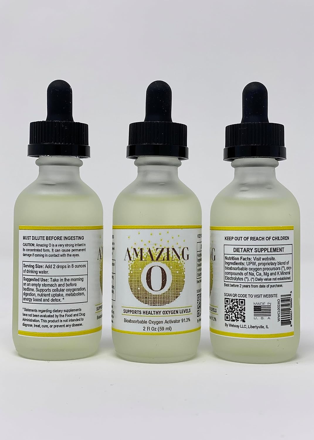 Three bottles of 'Amazing O' dietary supplement with droppers on a white background