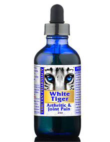 A 2oz blue glass dropper bottle of Tibetan Pharmacy White Tiger Arthritic & Joint Pain relief oil, featuring a white tiger graphic on the label.