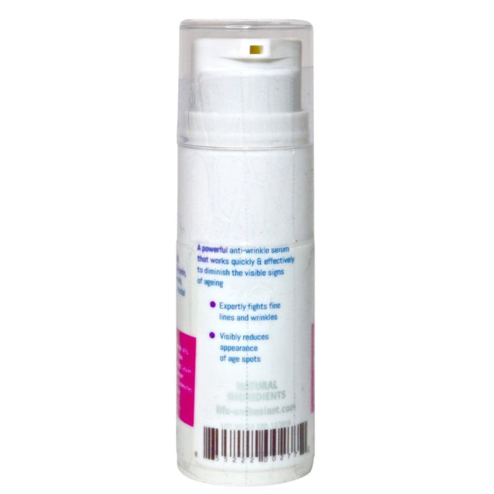 Skincare serum bottle with text on a white background