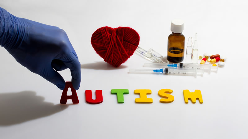 Autism spelled, heart, needles, medicine